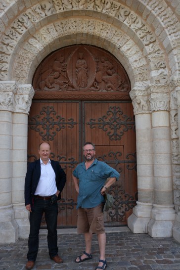 Ian Mortimer and I outside the great doors to the church